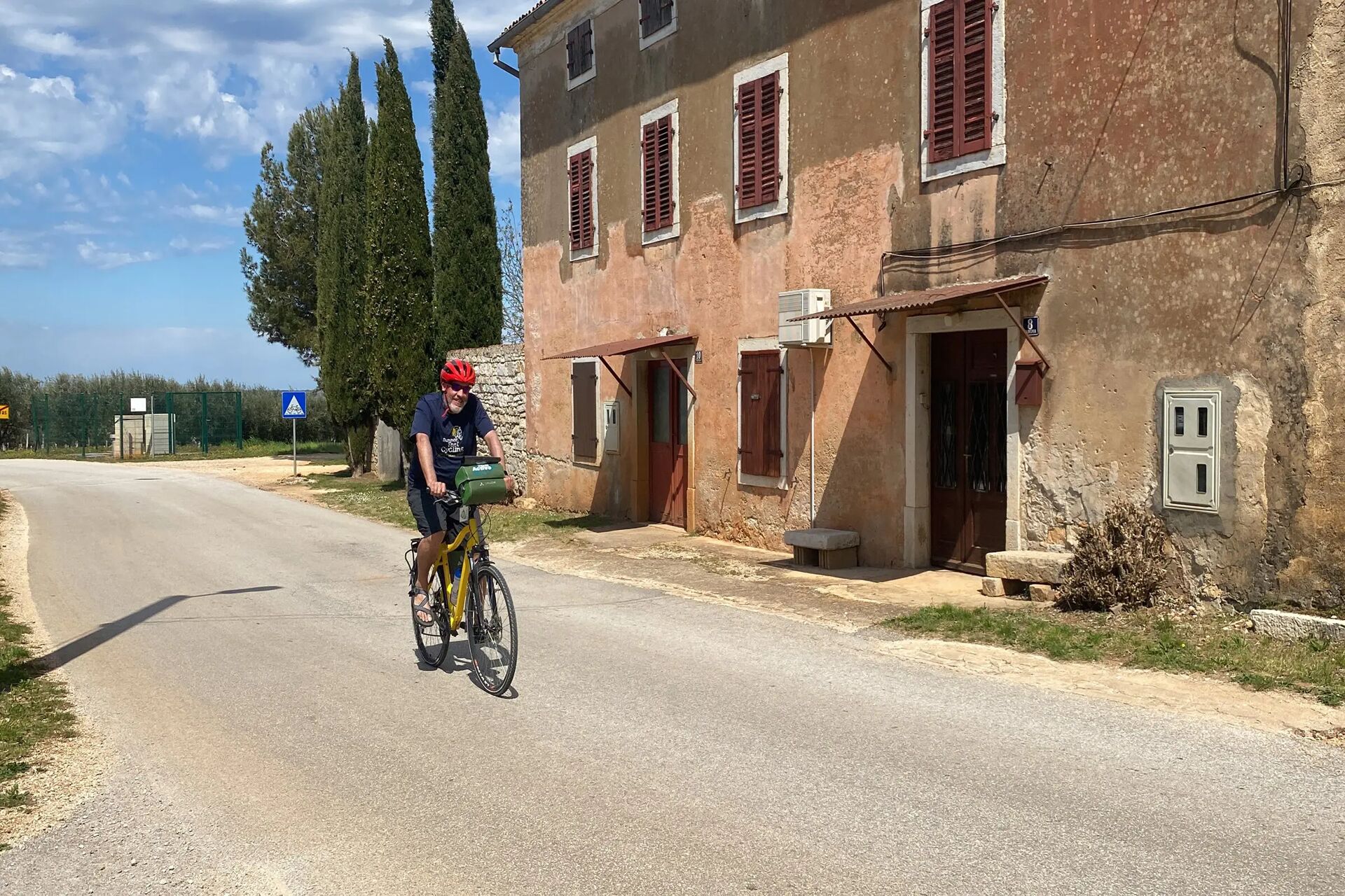 Riding a bicycle through a Croatian town
